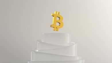 a gold crown on a stack of white paper