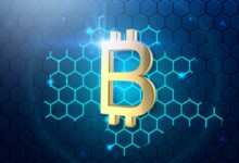 a golden bitcoin on a blue hexagonal background