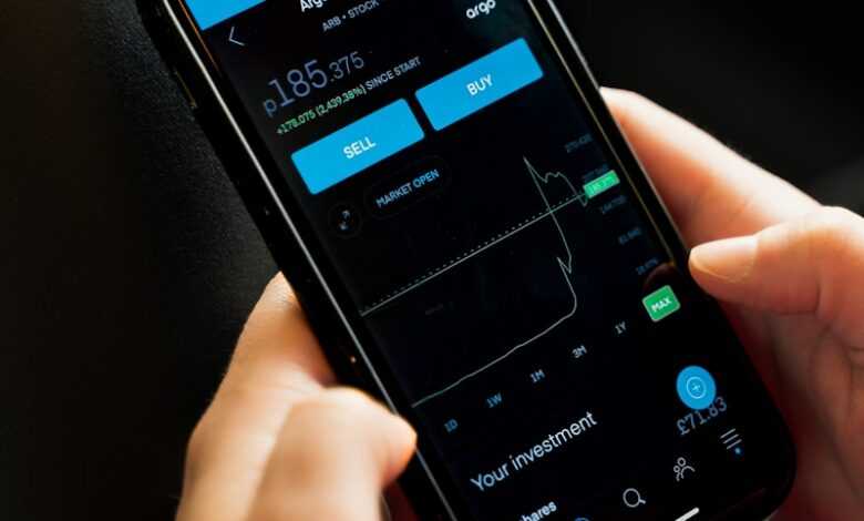person holding black android smartphone